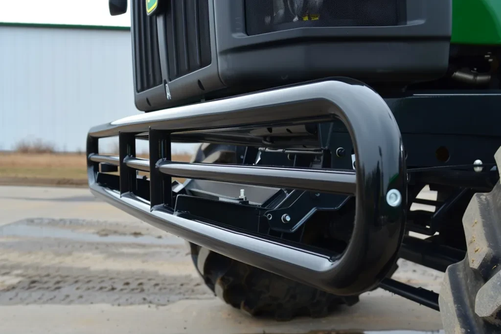 A black front bullbar for the John Deere