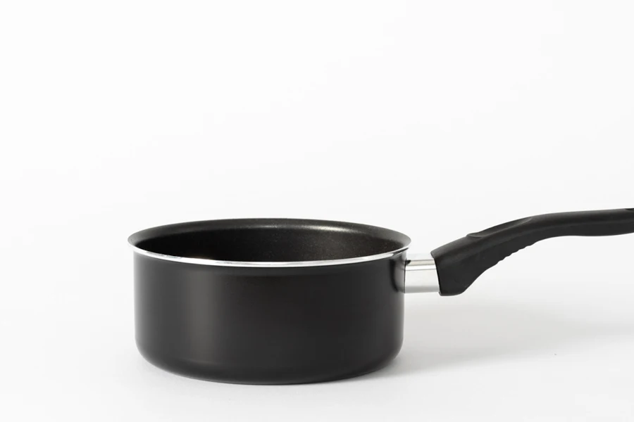 A black saucepan with a long handle