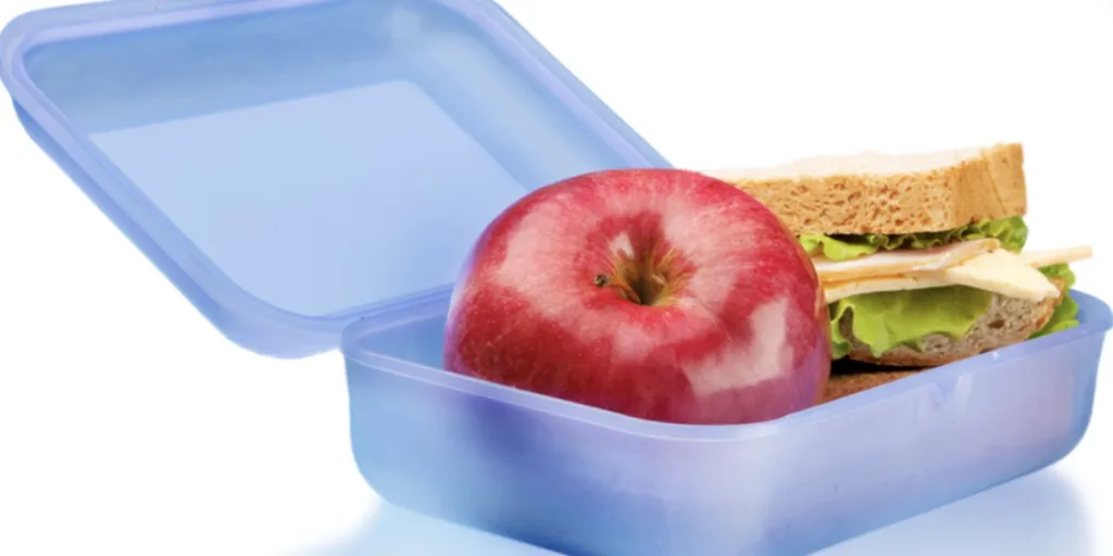 A blue lunch box with food