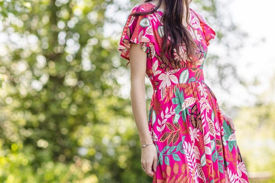A pink sundress with playful sleeves