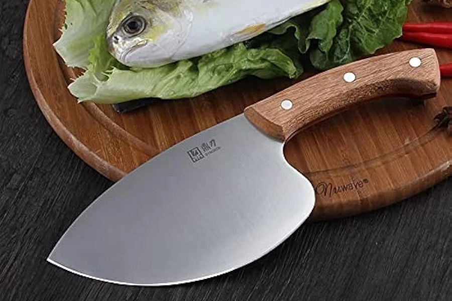 A sharp knife on a chopping board