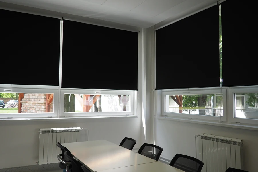 Blackout roller blinds in an office setup
