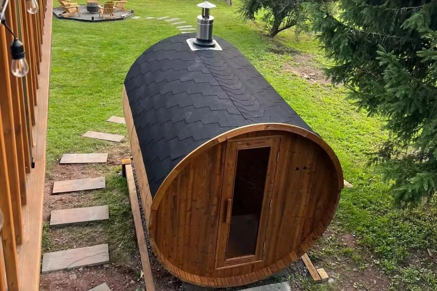 Eight- to ten-person barrel sauna with roof shingles