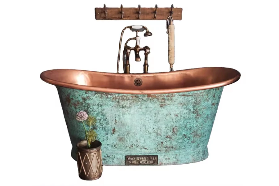 Freestanding copper bathtub with natural verdigris