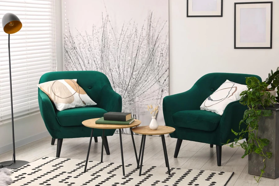 Green armchairs with nesting tables