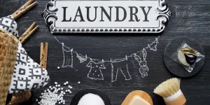 Laundry written on a board with laundry essentials