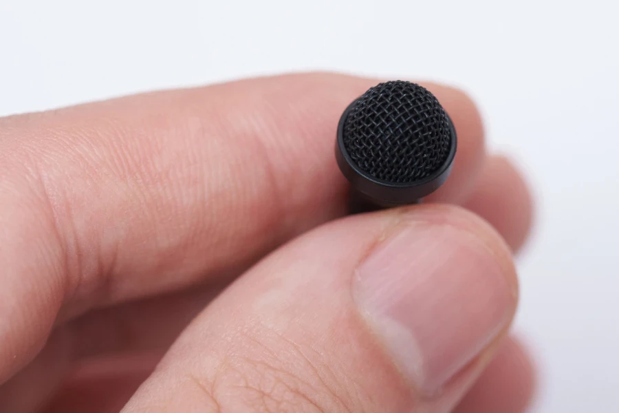 Macro of lavalier microphone isolated on white background