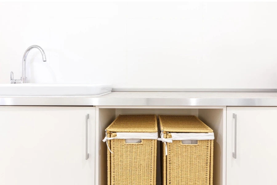 Modern white laundry room with two baskets