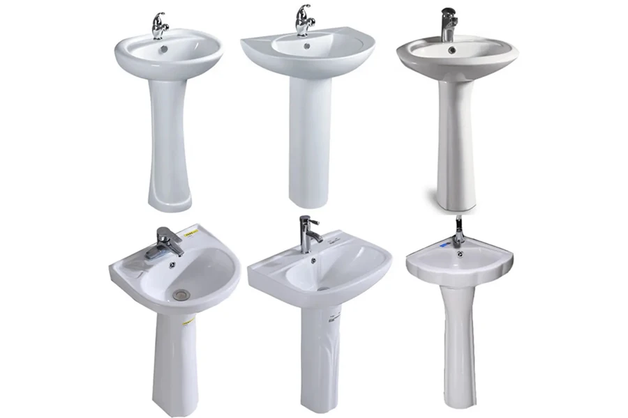Multiple pedestal-style white ceramic wash basins