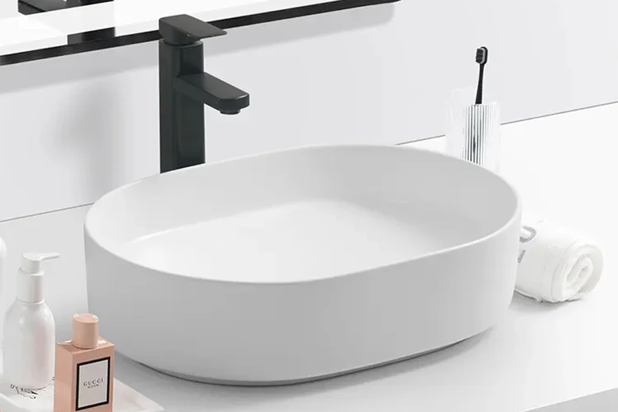 Oval-shaped white ceramic wash basin