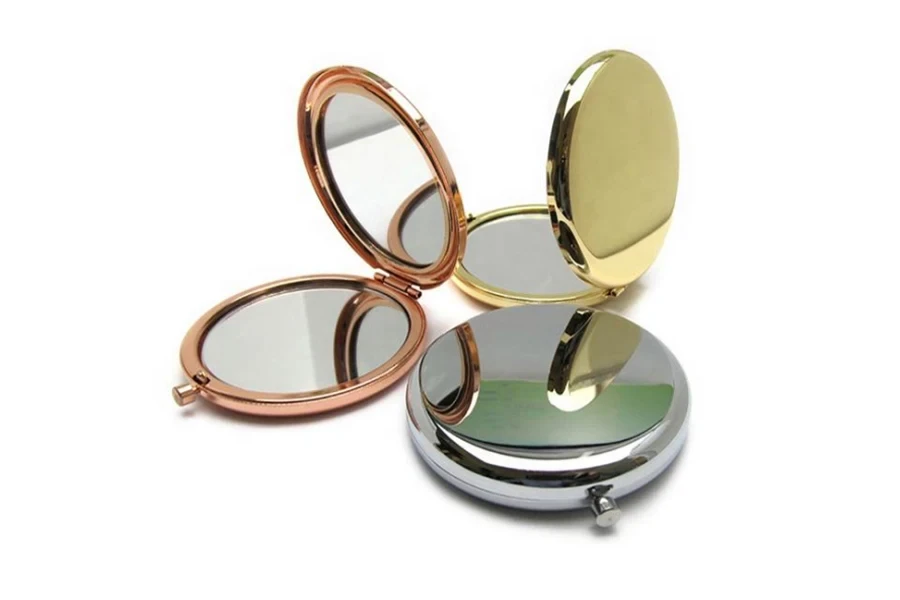 Miroirs compacts portables en or rose et argent