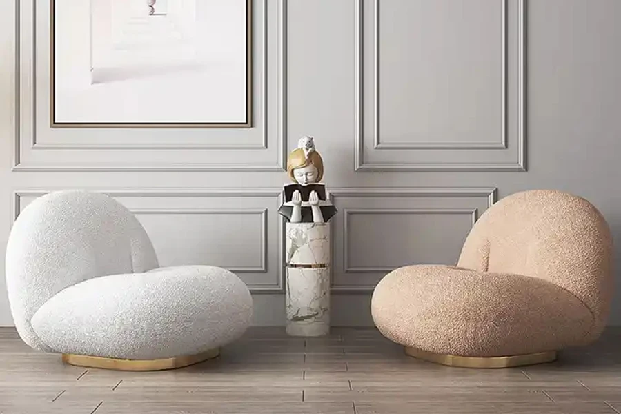 White and camel boucle chairs on gold metal bases