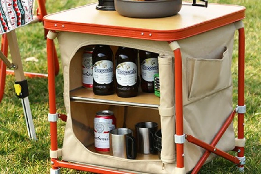 A collapsible storage box next to a chair outdoors