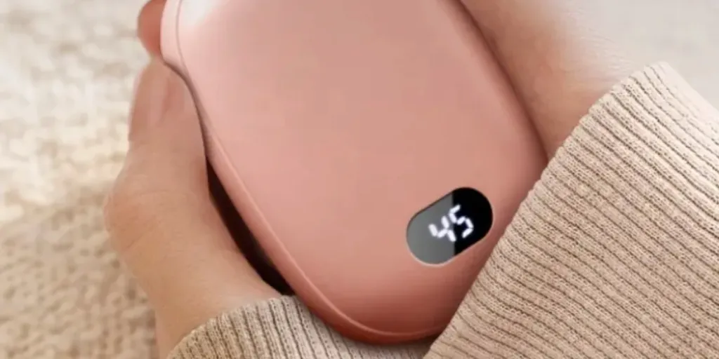 a pink rechargeable hand warmer