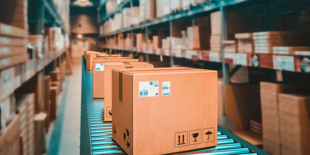Boxes on a conveyor belt in a warehouse