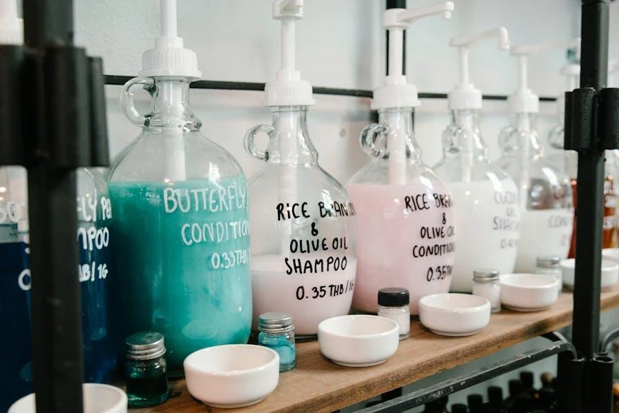 Different colored shampoos on a shelf