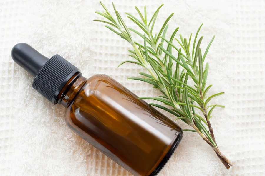 bottle of essential rosemary oil
