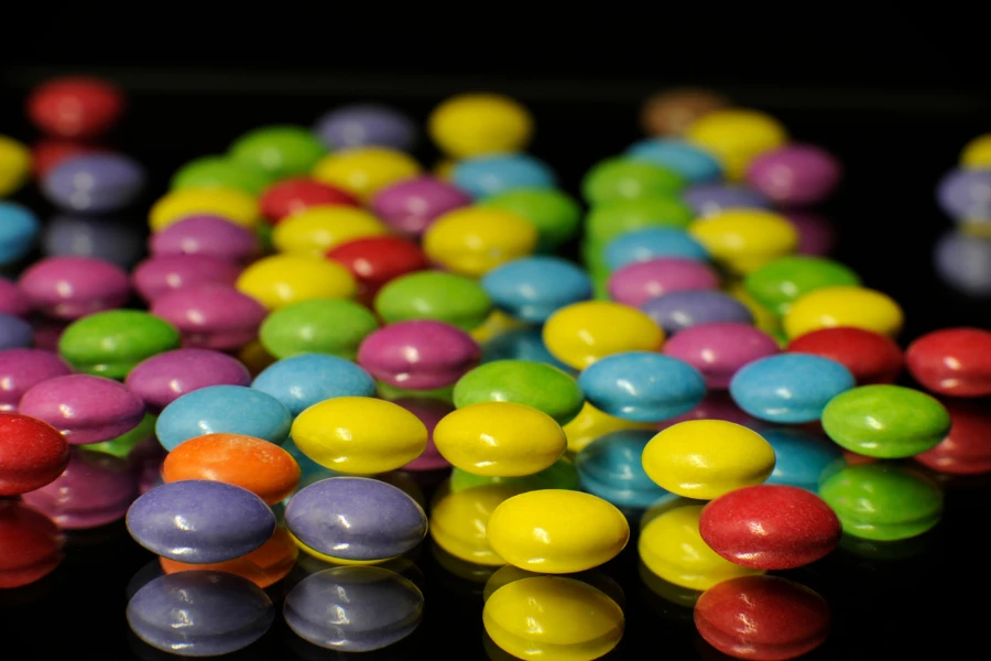 colorful sweeties on black background
