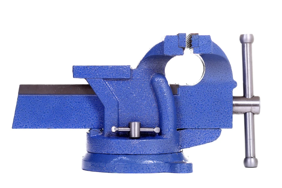Blue bench vise isolated over white background

