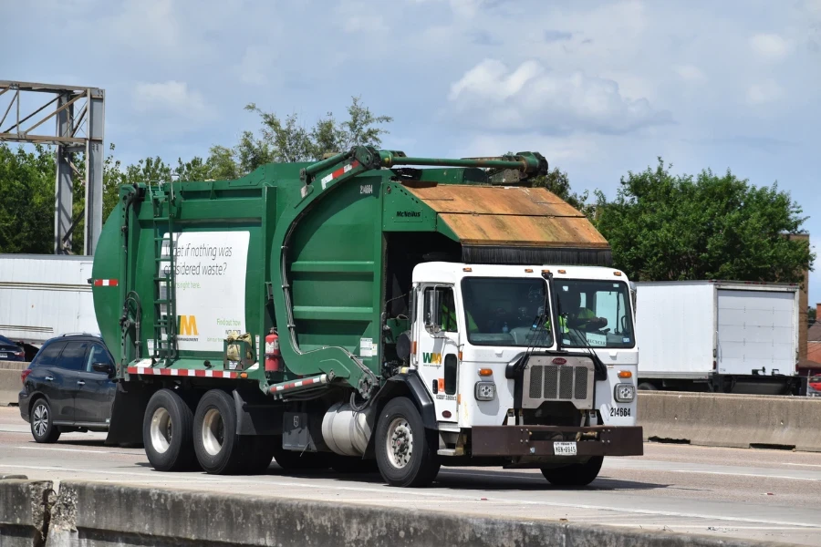 Garbage truck shares the highway on Gulf Freeway
