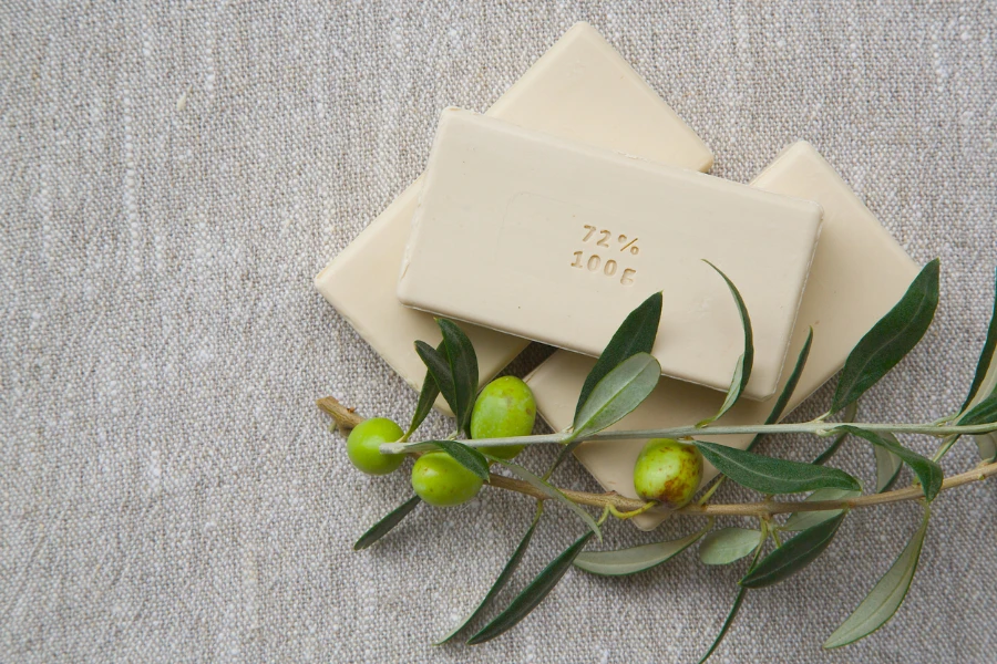 Soap bars with olive oil and olive tree twigs
