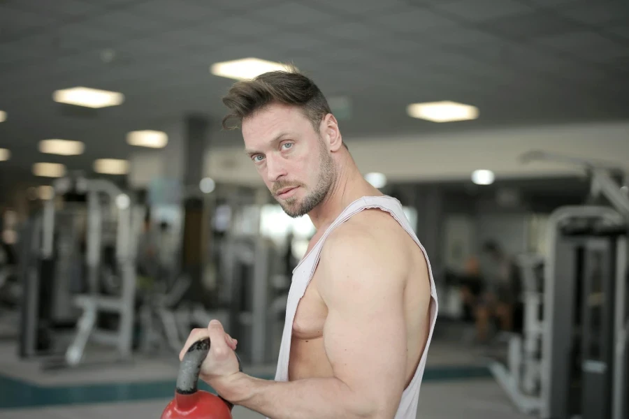 sportsman holding kettlebell