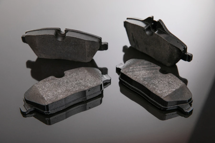 set of brake pads on a mirror background