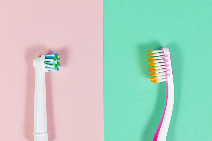 Side-by-side comparison of a manual and sonic toothbrush