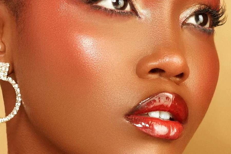 Woman showcasing red glossy lips