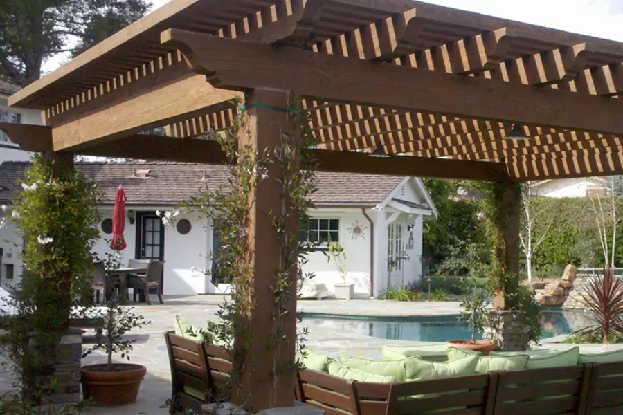 Wood-plastic composite trellis with pillars and slatted roof