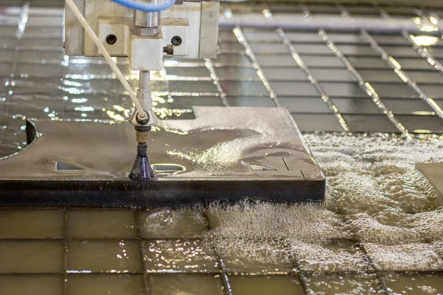 Automated waterjet metal cutting machine in action