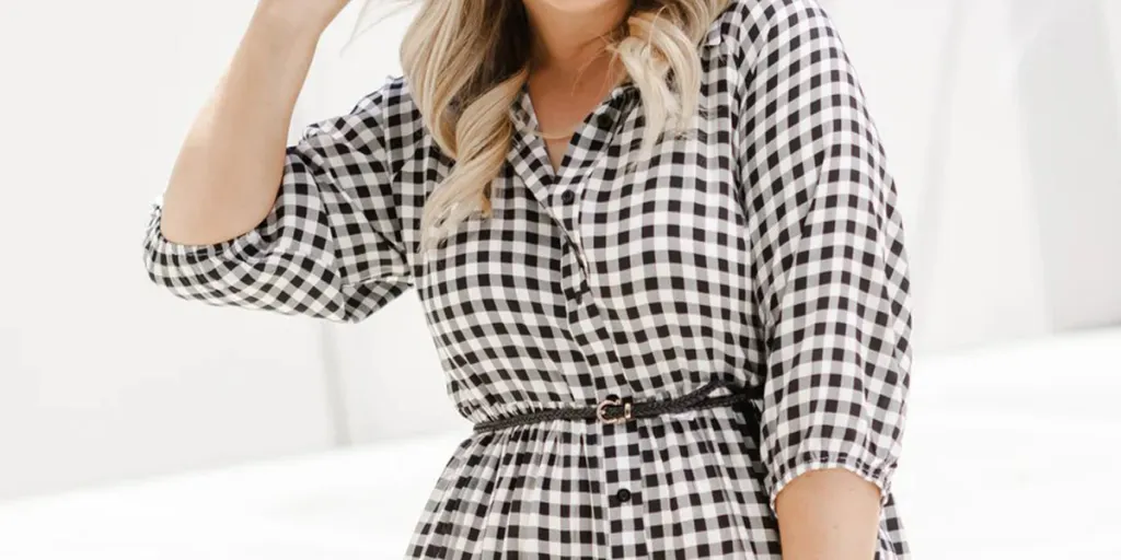 Blonde lady rocking a black and white gingham dress