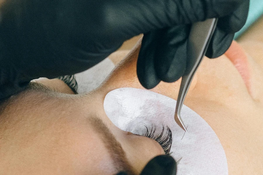 a Person Getting an Eyelash Extensions