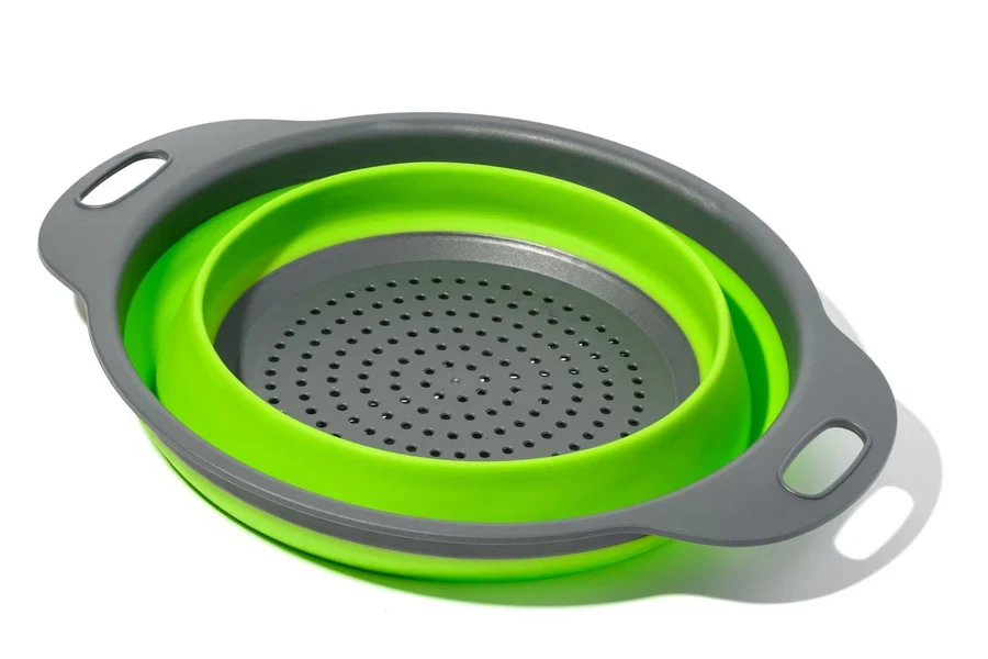 Gadgets for the kitchen. Plastic colander. 