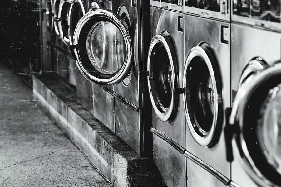 Grayscale Photography of Front-load Washers by Adrienne Andersen