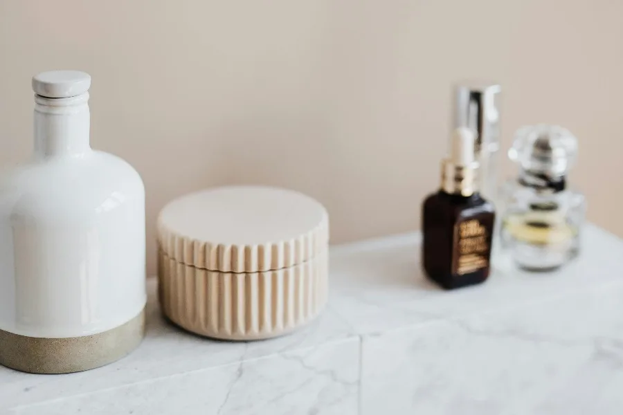 Marble shelf for cosmetics storage in modern bathroom