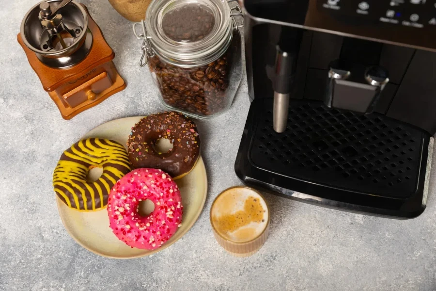 Modern coffee machine with a cup on the kitchen table