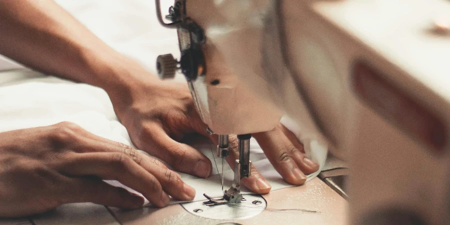 Person Holding Sewing Machine