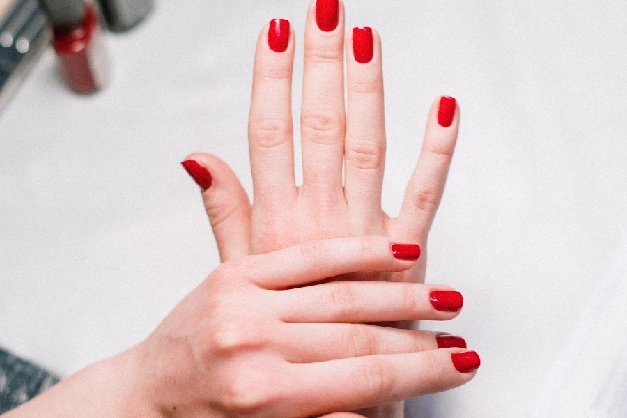 Person With Red Nail Polish