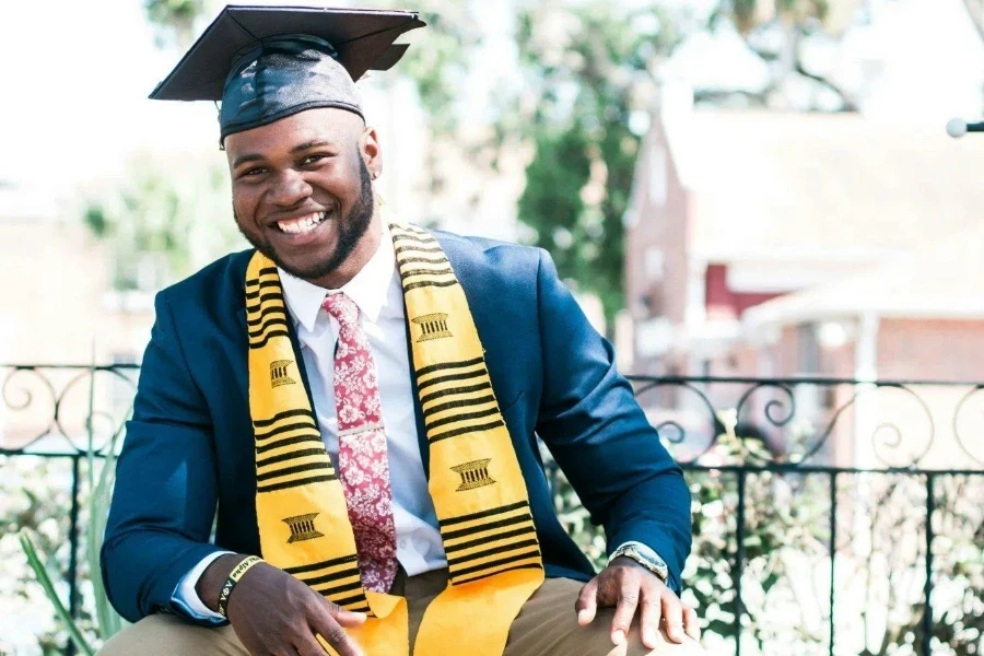 Photo of Man Wearing Graduation Cap