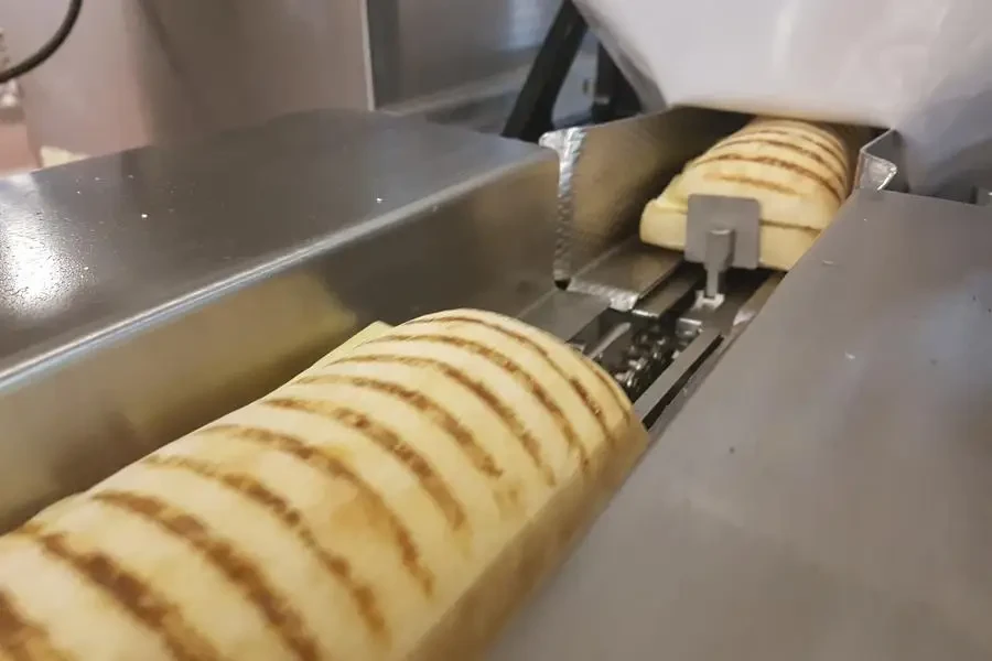 The design of churro maker machines varies