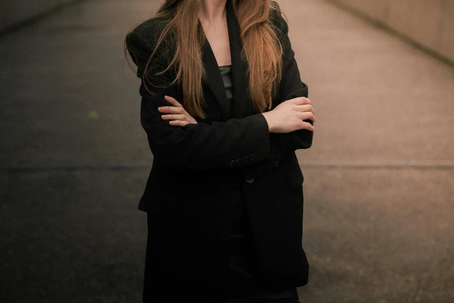 Woman Wearing Black Blazer on a Square