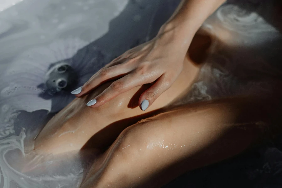 Woman in Water With Water Droplets