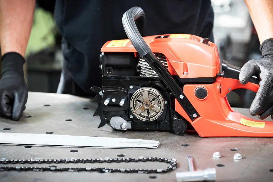 Work in the workshop, changing the chain in the chainsaw