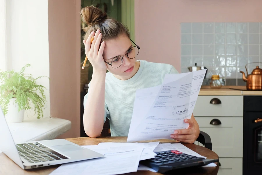 Young woman looking at financial statistics