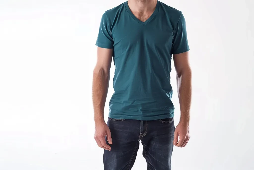 a man wearing an teal blue vneck tshirt