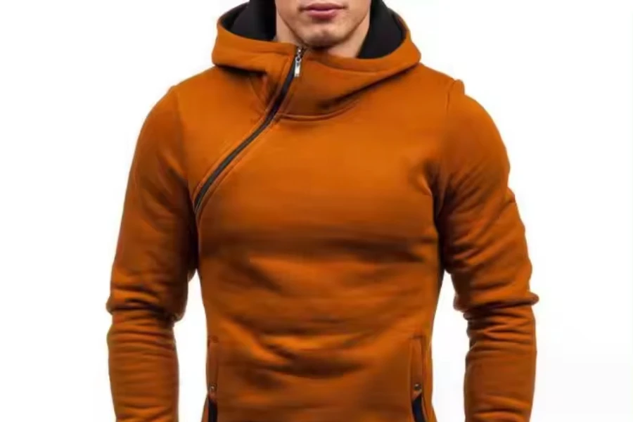 Close-up view of a man in a diagonal zipper hoodie