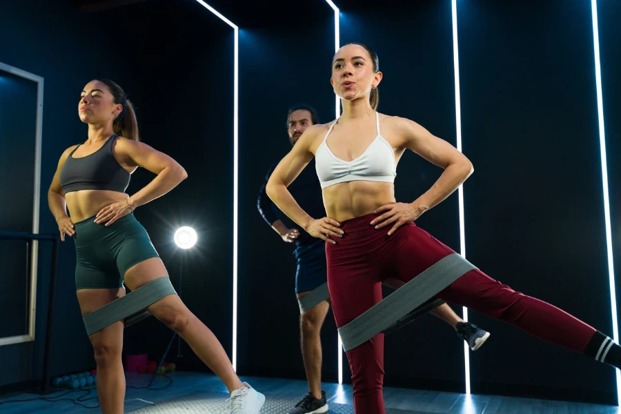 Focused participants in a high-intensity workout class