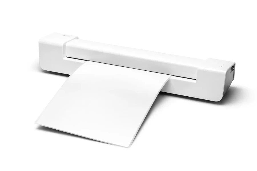 White laminator with a white sheet of paper