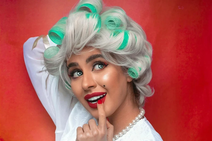 young pin up female with white hair in curlers